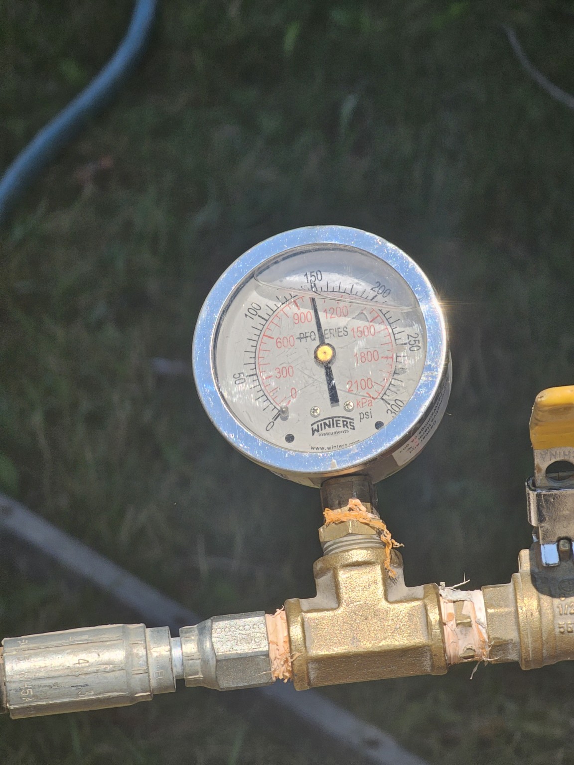 Field pressure gauge used to verify an active system condition
